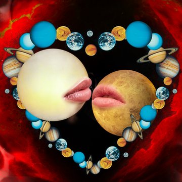 two planets kiss inside a heart, also made of planets